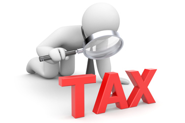 Panáčik s lupou nad nadpisom TAX